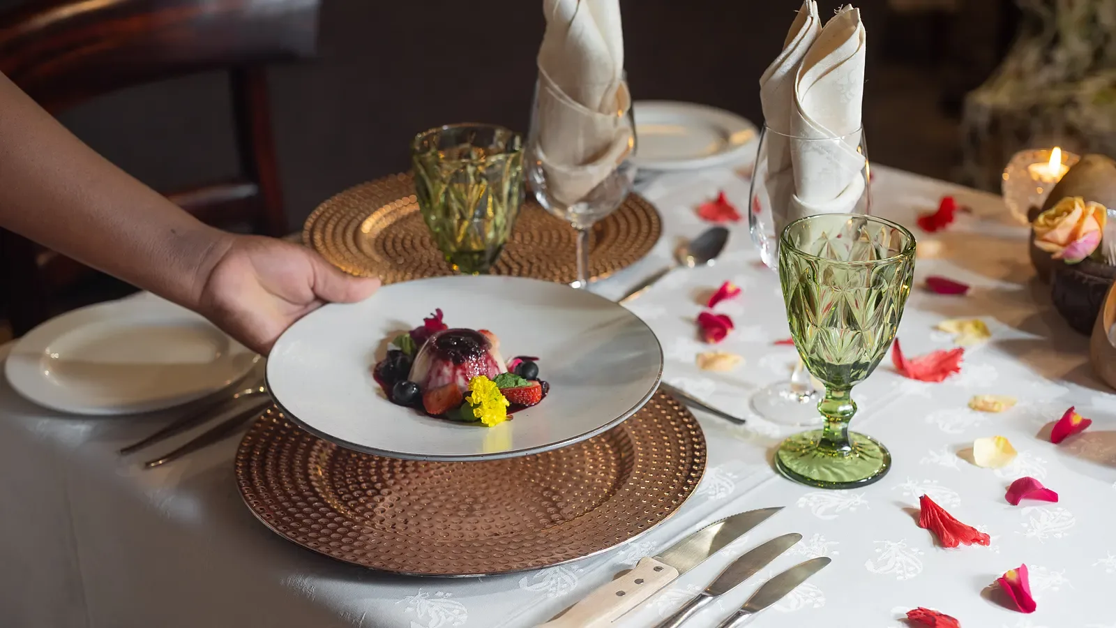 A signature plated Nzumba main course, locally sourced and elegantly composed