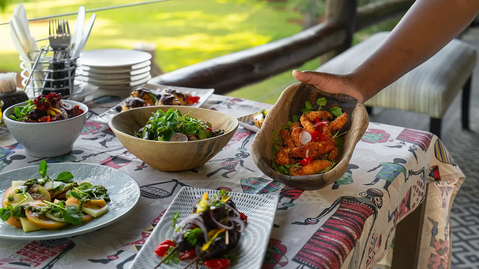 A plated Nzumba starter — fresh, vibrant, and finely arranged