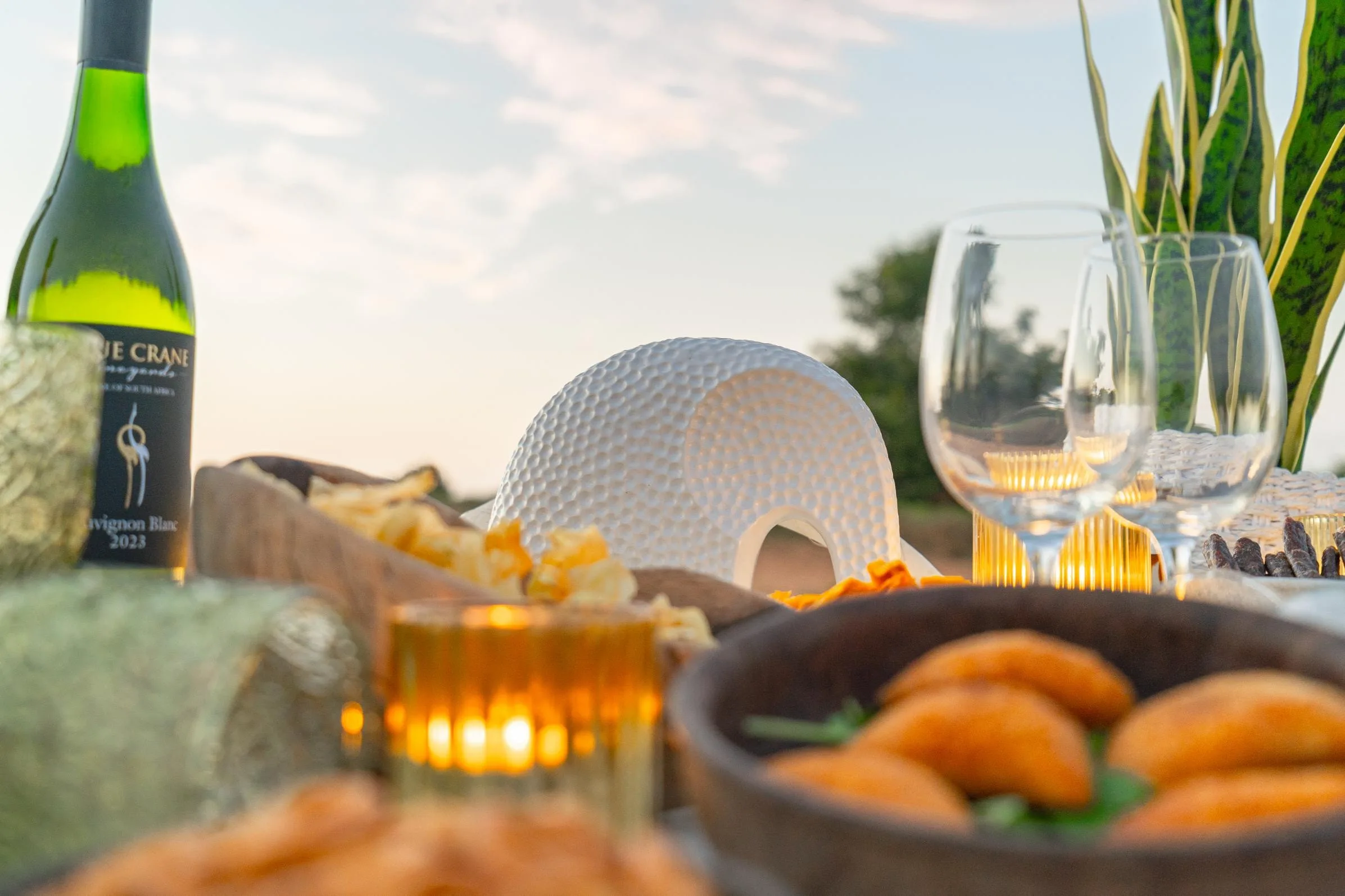 Snacks and a wine selection at a sundowner stop in Klaserie