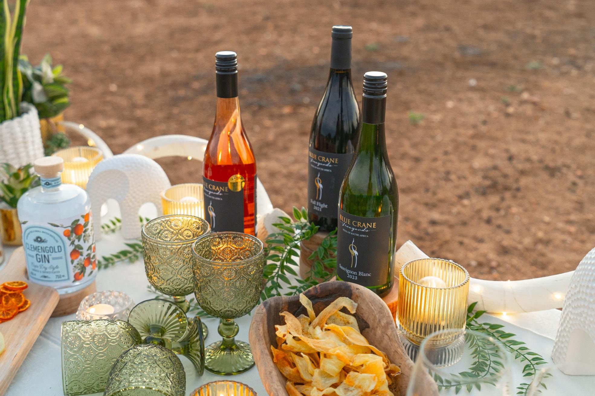 A Nzumba guide setting up the sundowner spread for guests