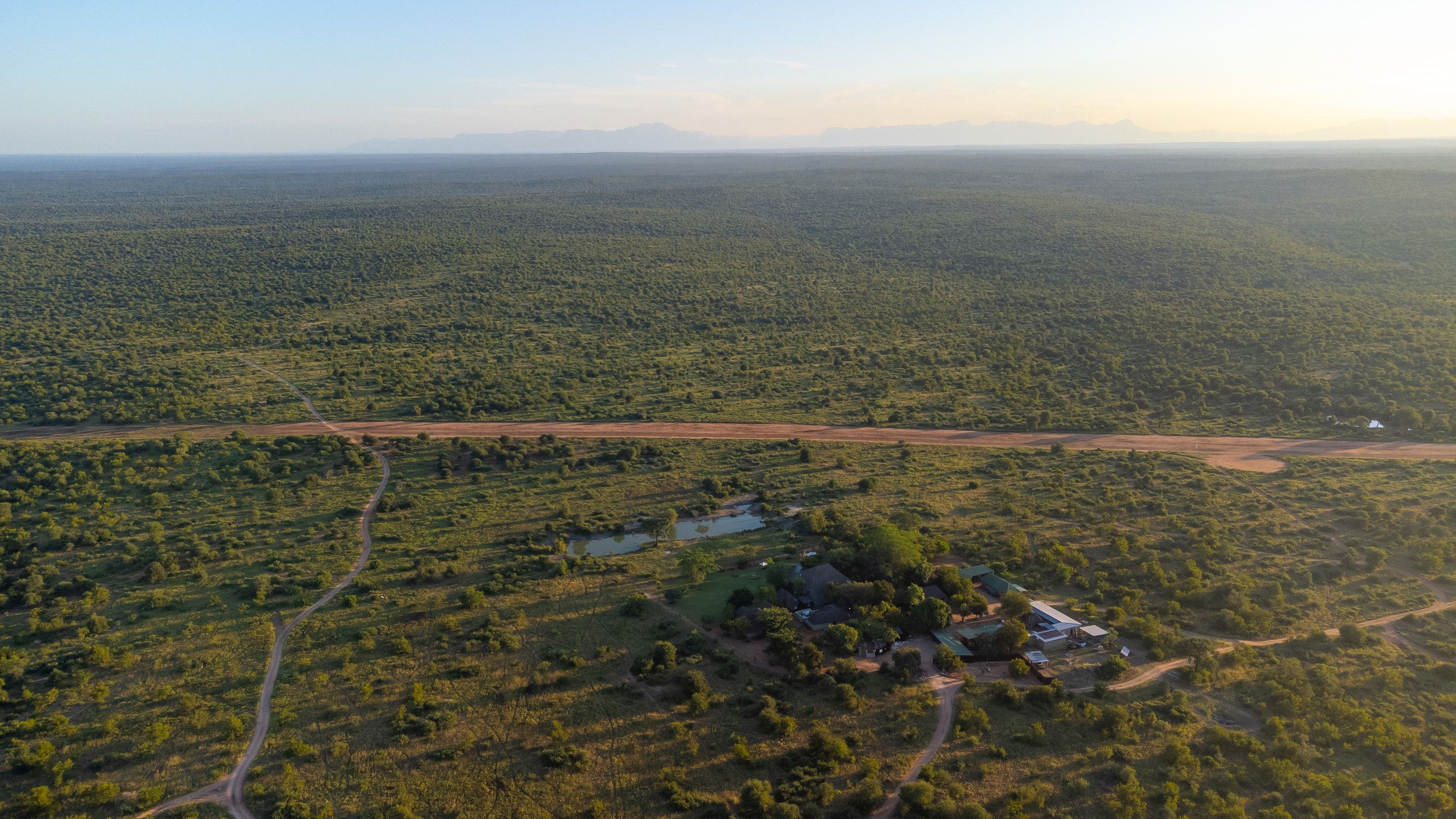 Aerial view of Nzumba Lodge in the Klaserie bushveld at golden hour