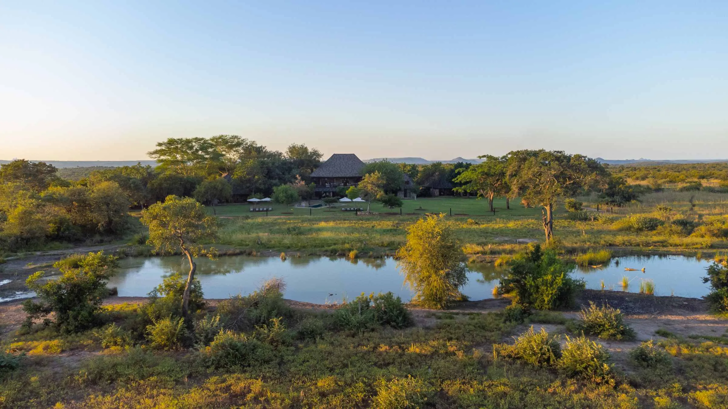 Wide drone view across the bushveld at golden hour in Klaserie Private Nature Reserve