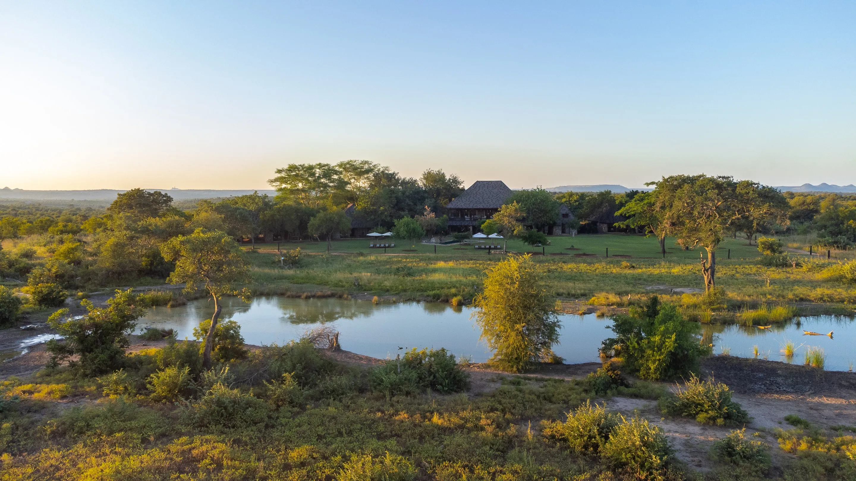 Wide drone view across the bushveld at golden hour in Klaserie Private Nature Reserve